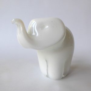 Langham Glass elephant paperweight sculpture, vintage white trunk up figurine