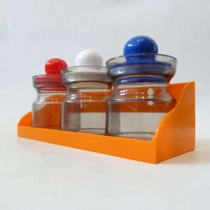 Retro small plastic kitchen pots and orange storage shelf. 1970s jars containers
