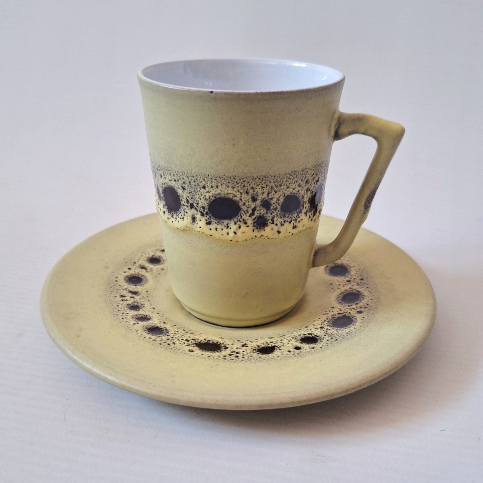 West German pottery vintage cup & saucer, yellow + black fat lava glazes, retro