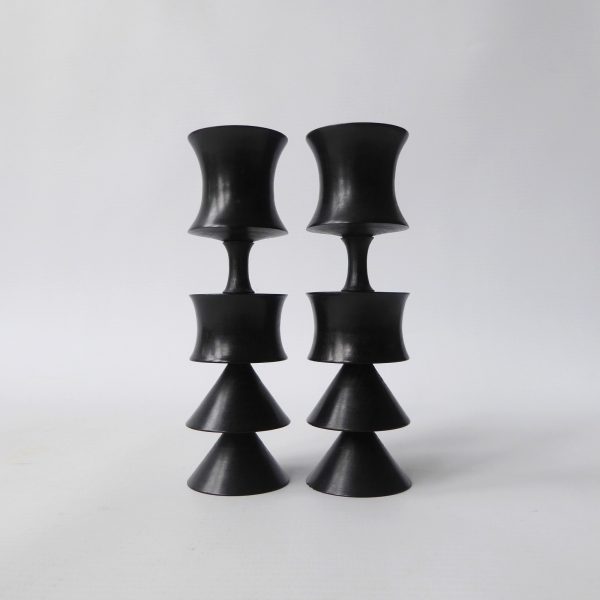 2 vintage ebony or black wood carved candlesticks. Black hooped, Japanese style
