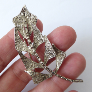 Abstract silver tone vintage brooch, brutalist textured leaf + backbone. 1960s