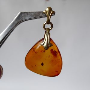 Vintage amber pendant for necklace, probably mid century, gold coloured bail