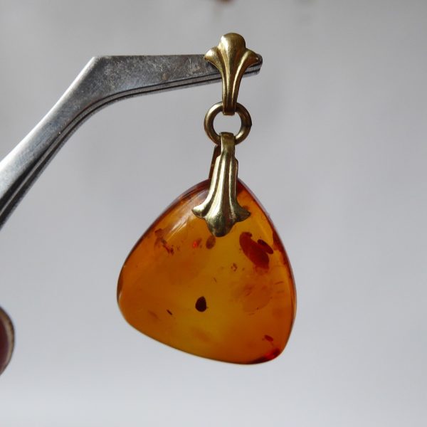 Vintage amber pendant for necklace, probably mid century, gold coloured bail