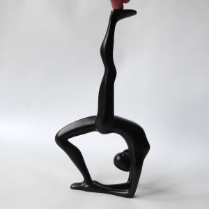 Gymnast dancer figurine, black sculpture statue. Modernist female figure retro