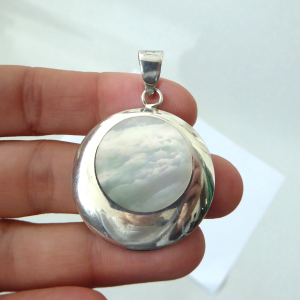 Sterling 925 silver modernist pendant with round inset flat white pearl shell.
