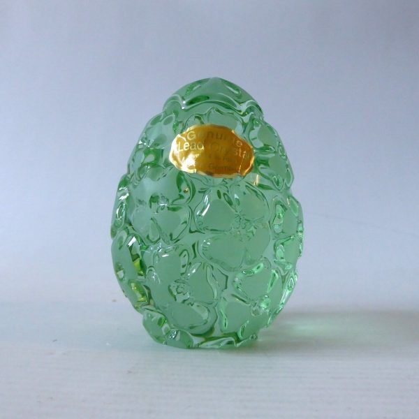 German lead crystal glass egg shaped paperweight ornament. Light green flowers