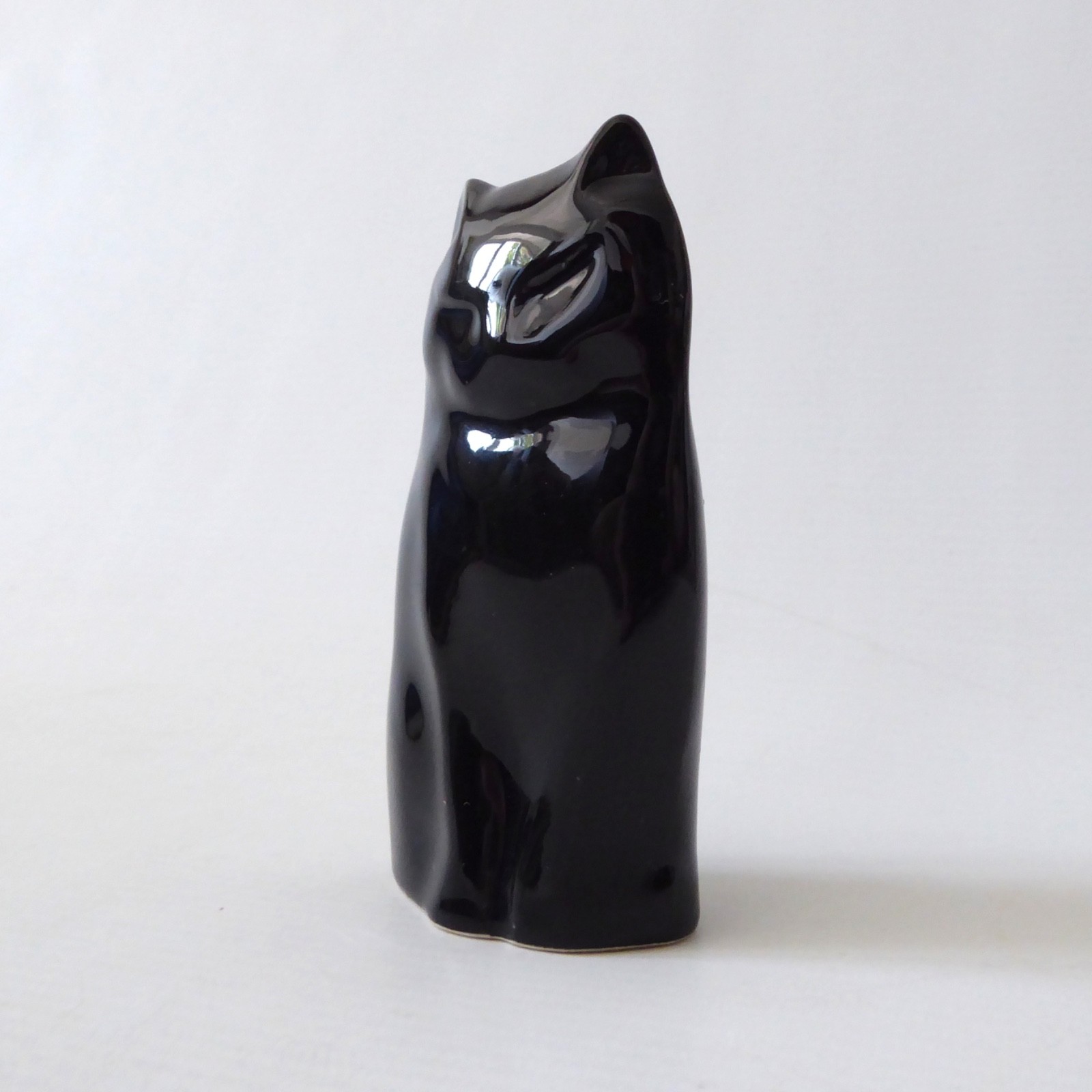 Jim Cooper pottery ceramic cat, small black glazed figure, modernist minimalist