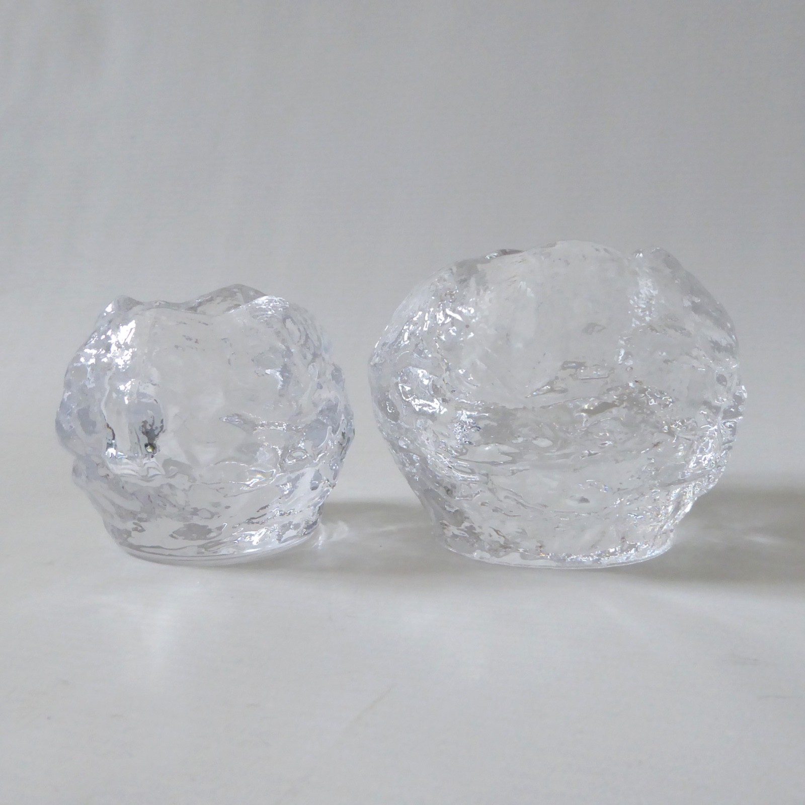 2 Kosta Boda Snowball candle holders, small medium votive. Swedish glass crystal