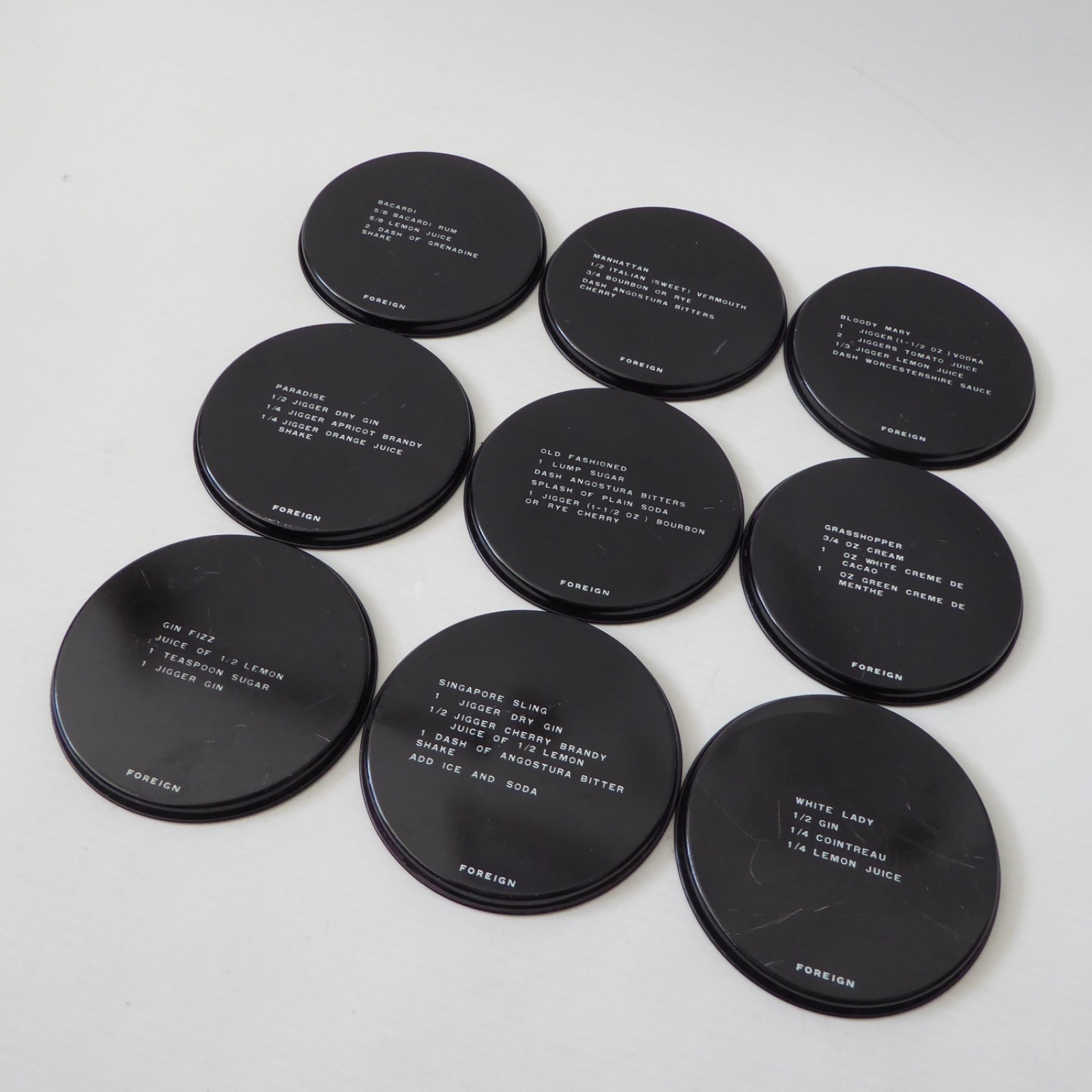 9 vintage Finnish cocktail coasters 1980s, black retro drinks mats. Finland tin - Image 13