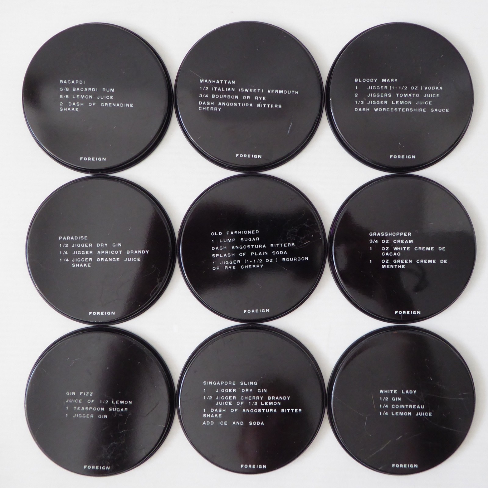 9 vintage Finnish cocktail coasters 1980s, black retro drinks mats. Finland tin - Image 14