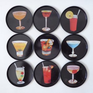 9 vintage Finnish cocktail coasters 1980s, black retro drinks mats. Finland tin
