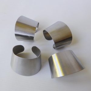 Thos. Nutbrown stainless steel 4 vintage modernist napkin serviette rings, 1970s