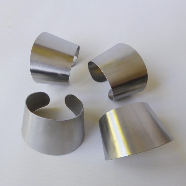 Thos. Nutbrown stainless steel 4 vintage modernist napkin serviette rings, 1970s