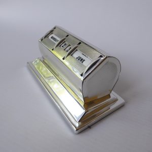 Vintage perpetual calendar, chromed machine cut silver metal. Desk accessories