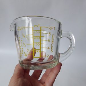 Vintage JAJ Pyrex glass small capacity measuring jug, yellow. Cups, ml, ounces