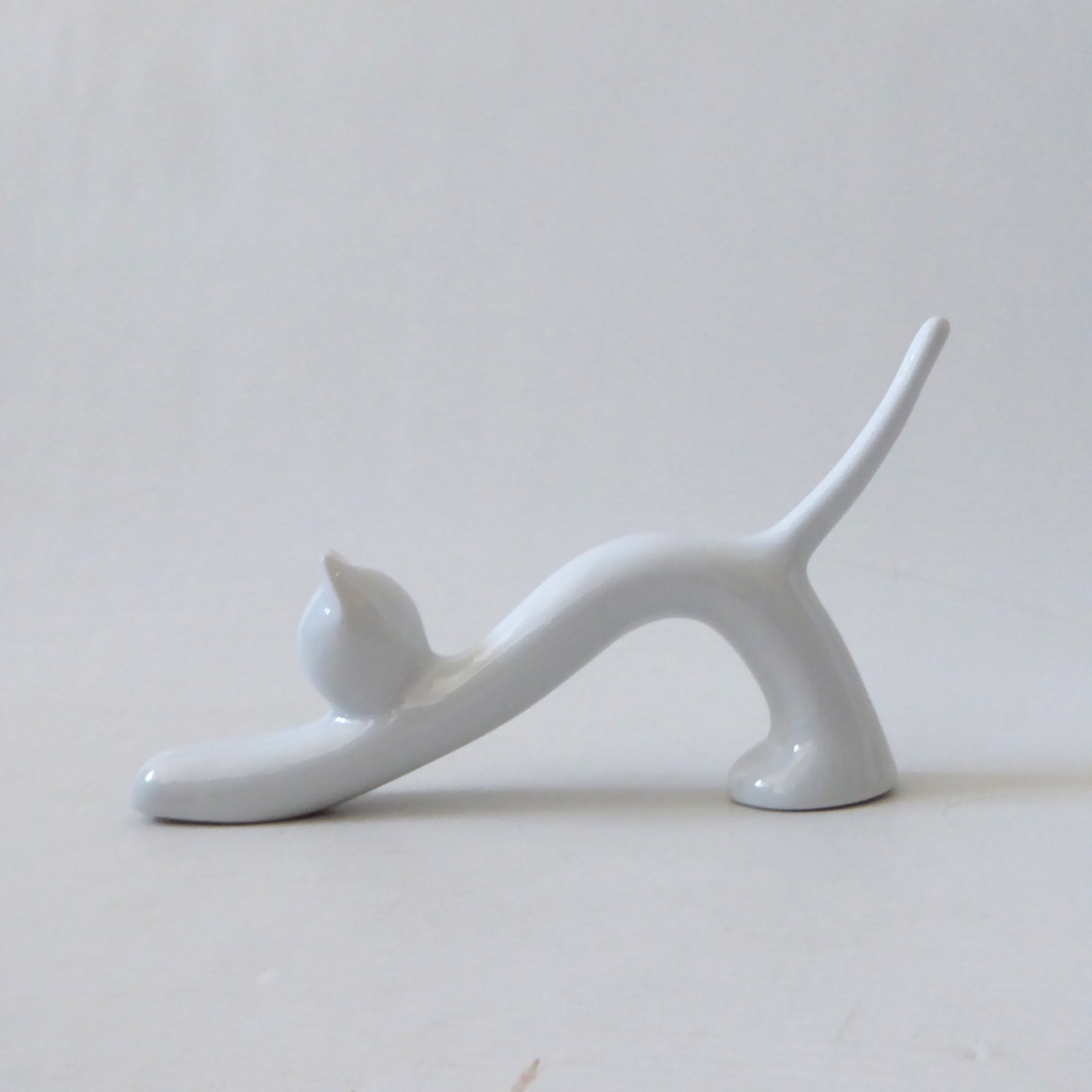 Naamen Israel white porcelain stretching cat figurine Modernist simplified 1970s